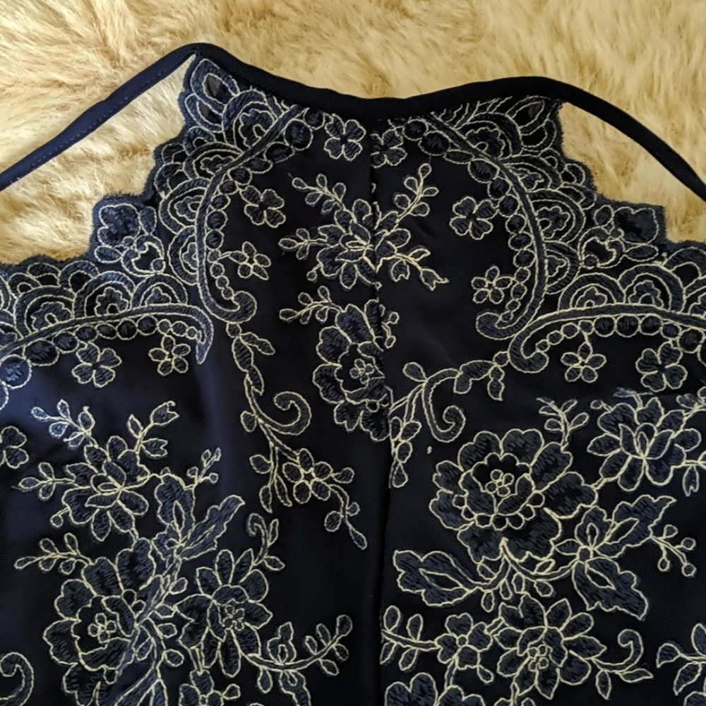 A romper - Picture 2 of 4
